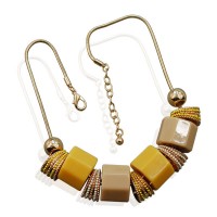 Kurze modische Halskette mit Elementen "Girome - yellow"